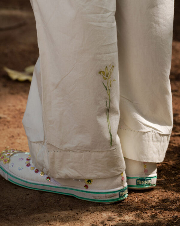Ahmev’s Luxurious Ankle Length Pants with Overlapping Pleats and Floral Hand Painting