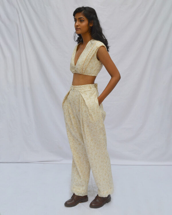 Ahmev’s Sheer Fabric Overlap Pleated Pants: Timeless Elegance