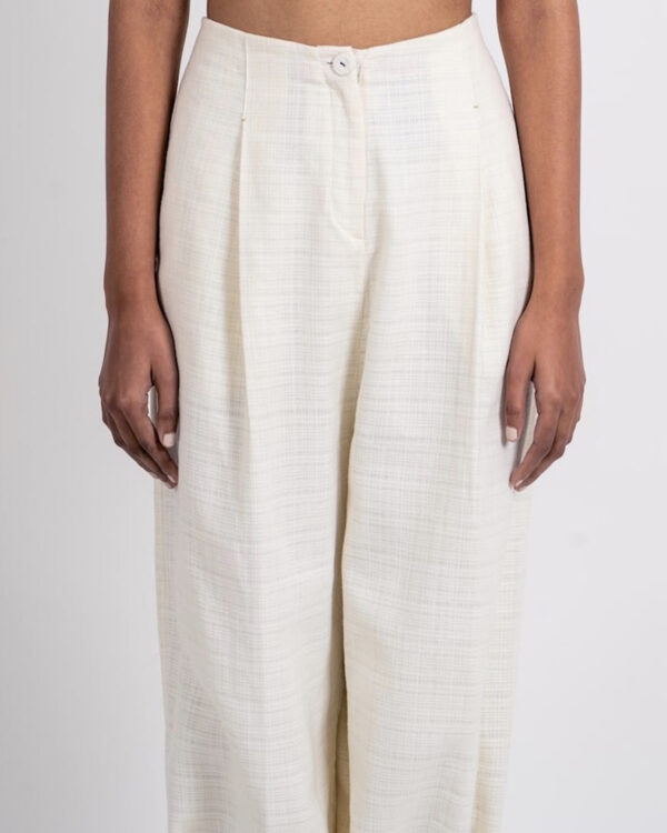 Upgrade Your Style with Ahmev’s Textured Ankle Loop Khadi Pants in Ivory, Beige & Blush.